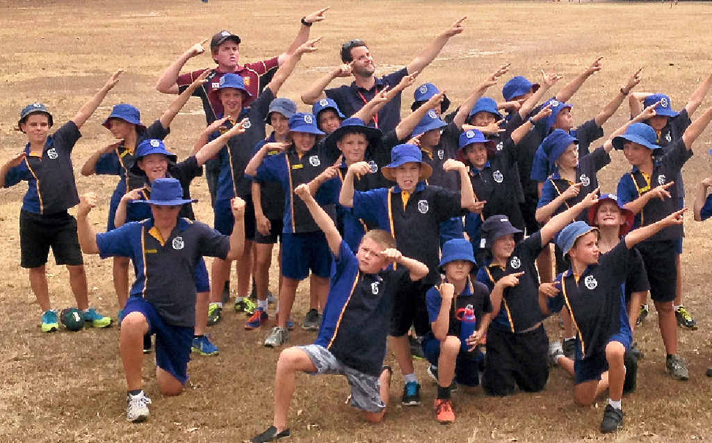 AFL Sunshine Coast’s Jarrod Raun with Gympie South Primary School students ready to take part in the Future Cats program starting tonight. AFL Sunshine Coast’s Jarrod Raun with Gympie South Primary School students ready to take part in the Future Cats program starting tonight.